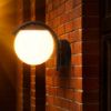 Immagine di APPLIQUE A MURO CON SFERA OPALE INFERIORE CON PORTALAMPADA ATTACCO E27 COLORE NERO IP44 VT-1150 V-TAC